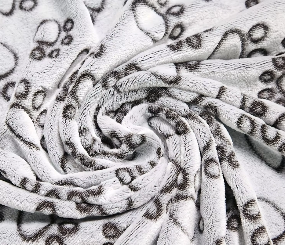 Hemtrevlig Hundfilt för Soffan – Mjuk Filt med Tassmönster